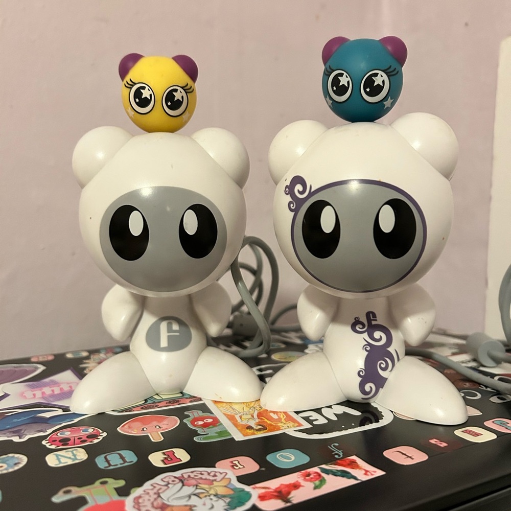 Funko White and Gray Figures with Yellow and Blue Companions